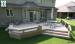 Large, single level deck with a bench and planter boxes.